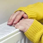 Hands on cold radiator